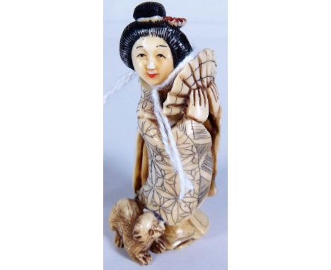 GEISHA NETSUKE. Ivory Geisha with animal netsuke, H - 5 cm