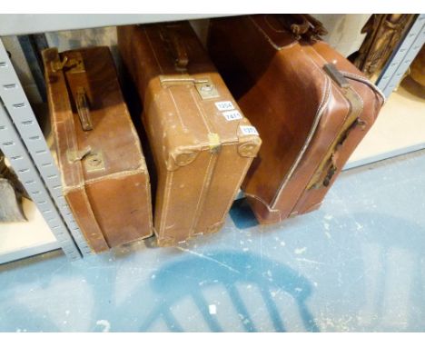 VINTAGE SUITCASES. Three vintage suitcases including leather