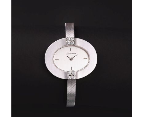Girard-Perregaux. Damen-Armbanduhr. 18 kt. WG, gest., mattiert. Handaufzug. Mattiertes Zifferblatt, Zentralzeiger, Indizes, b
