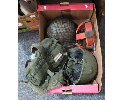Box of mixed militaria to include; British Army MKIV Falkland War helmet 1982, British Army helmet MK6, British plastic helme
