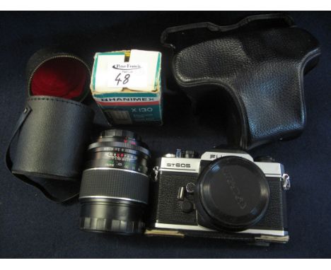 Fujica ST 605 35mm camera, together with a Hanimex 130 electronic flash in original box and Japanese lens in fitted case. (3)