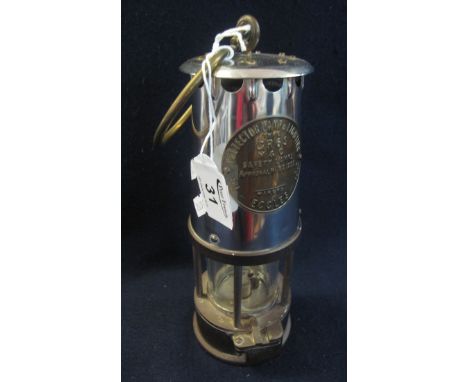 'The Protector Lamp &amp; Lighting Co Ltd, Eccles' miner's safety lamp. (B.P. 24% incl. VAT)
