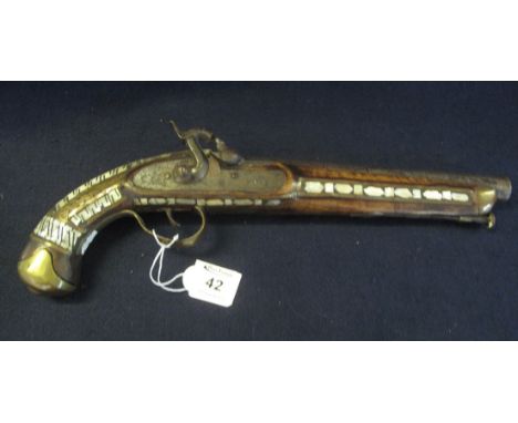 19th Century Middle Eastern percussion pistol fully stocked with brass fittings and overall inlaid with geometric mother of p