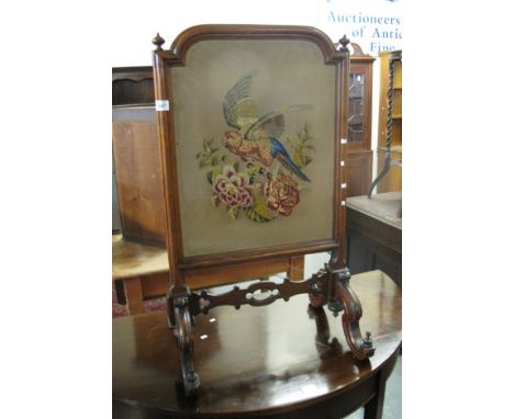 Victorian carved firescreen with the tapestry depicting parrot amongst foliage and flowers. (B.P. 24% incl. VAT)  CONDITION R