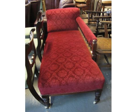Edwardian mahogany upholstered chaise longue on ring turned legs and ceramic casters. (B.P. 24% incl. VAT)