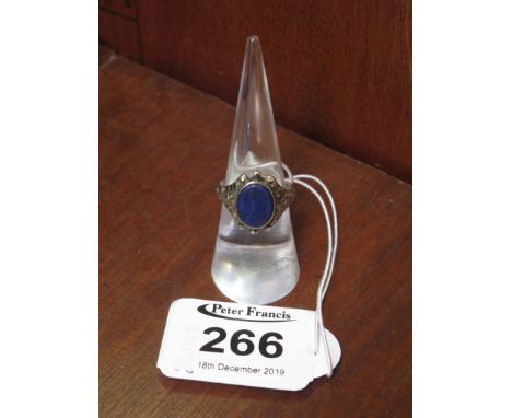 A lapis lazuli and silver ring. (B.P. 24% incl. VAT)