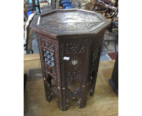 Middle Eastern design hardwood pierced and mother of pearl inlaid octagonal lamp table. (B.P. 24% incl. VAT)