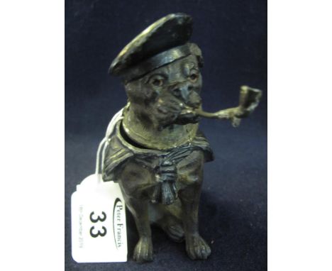 Novelty white metal inkwell in the form of a seated boxer dog smoking a pipe and wearing a navel hat. (B.P. 24% incl. VAT)