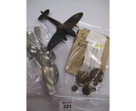 Bag of assorted flatware, mainly plate, with one pickle fork marked 800. Together with RAF cap badges, buttons, ration book d