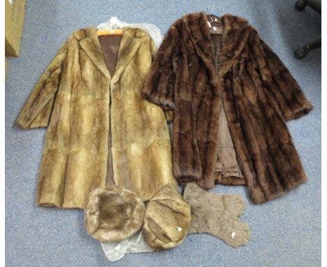 Two vintage fur coats, a pair of grey fur gloves, a faux fur hat and a fur hat. (4)(B.P. 24% incl. VAT)