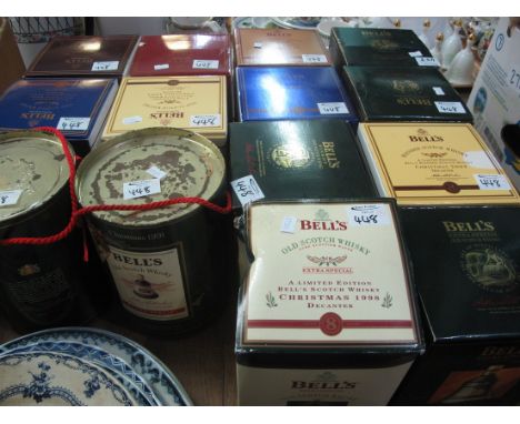 A selection of 14 Bell's Old Scotch whisky porcelain decanters, all sealed and in original boxes, various. (B.P. 24% incl. VA