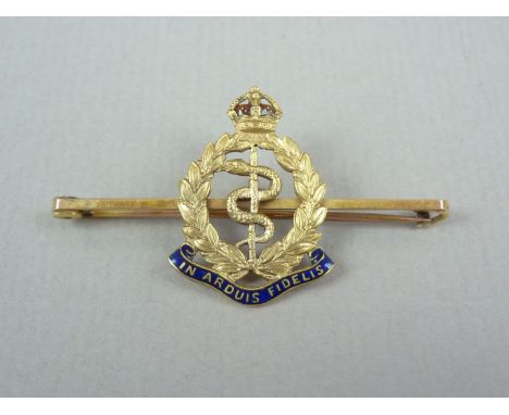 A Royal Army Corps enamelled yellow metal sweetheart brooch, stamped 9ct, tests as gold, 4.4g