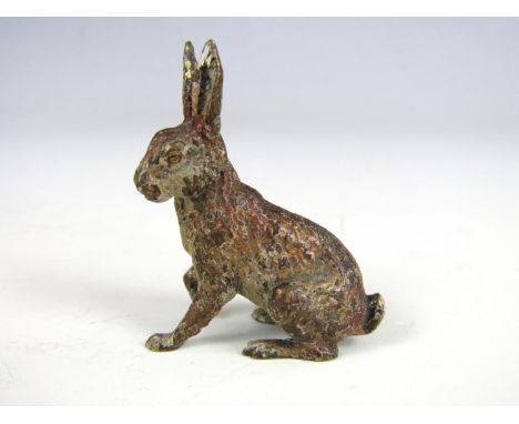 A late 19th / early 20th Century cold painted cast brass model of a hare, 4 cm