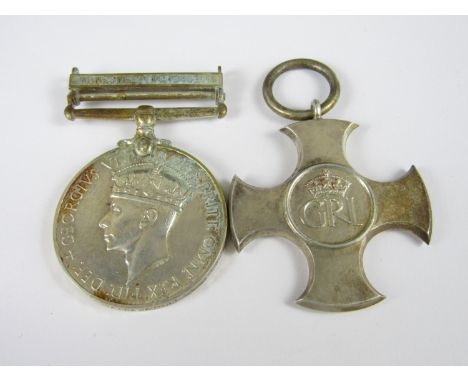 A George VI Distinguished Service Cross and General Service Medal, clasp Minesweeping 1945-51, the former engraved R W Wainew