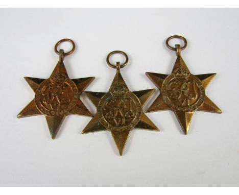 An Africa Star, engraved to 159329 Capt N C Gordon, R Signals, together with un-engraved Burma and Pacific Stars