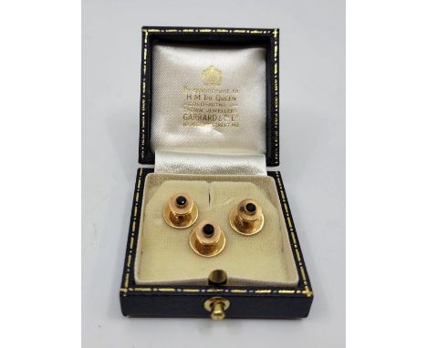 Three 9ct. gold and sapphire dress shirt studs, Birmingham 1965, each engine turned with mixed round cut sapphire in rub over