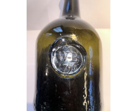 A scarce 18th century English sealed wine bottle in good condition.   No cracks internal no cracks external no chips good con