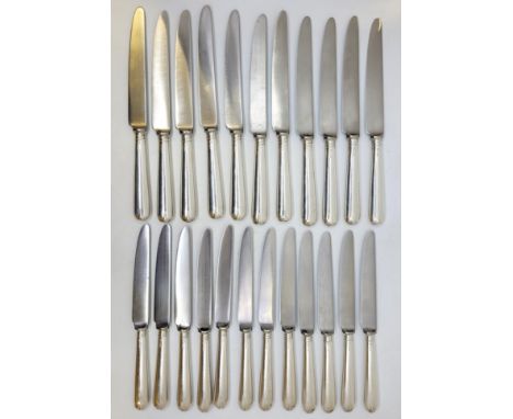 A set of twelve silver handled dessert knives and eleven silver handled table knives, by A Haviland-Nye, Sheffield 1973, stor