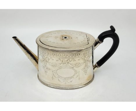 A Victorian silver teapot, by John, Edward, Walter & John Barnard, London 1872, with flush hinge, ebony handle and bright cut