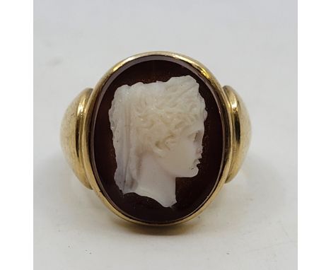 A 9ct. gold hardstone cameo ring, size UK Q. (gross weight 12.3g)   