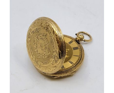 An 18ct. gold ladies' hunter fob watch, key wind, having engine turned and engraved dial with Roman numeral chapter ring, 35m