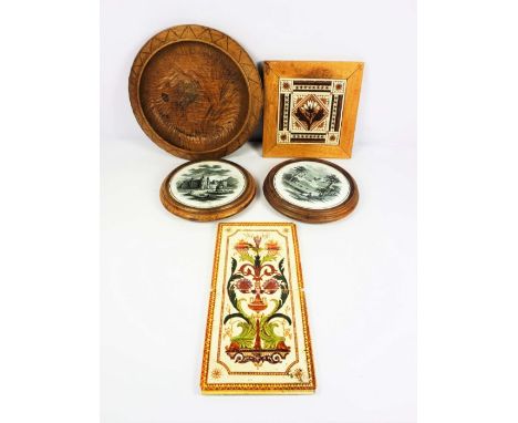 Two 19th century tile trivets, one transfer printed with a view of Balmoral, the other of Holyrood Palace, 21cm diameter; tog