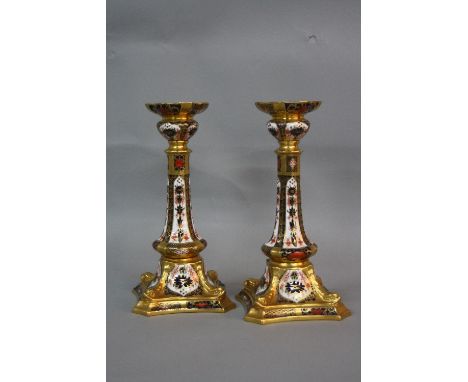 A PAIR OF ROYAL CROWN DERBY IMARI GOLD LINE CANDLESTICKS, '1128' pattern, first quality, printed and painted marks, height ap