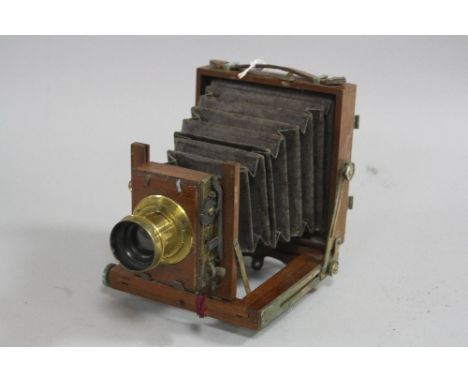 A SANDERSON MAHOGANY AND BRASS PLATE CAMERA, Houghton & Sons 'The Swift'