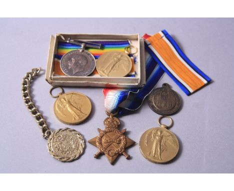 A PLASTIC BOX CONTAINING A NUMBER OF WWI MEDALS, British War & Victory medal pair correctly named to K.50620 E.Ward. STO.2. R