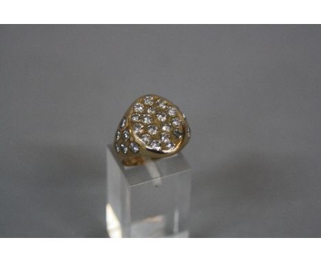 A MID 20TH CENTURY DIAMOND SET SIGNET RING, oval shape head measuring approximately 19mm x 14mm, round brilliant cut diamonds