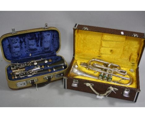 A CASED LE BLANC NOBLET CLARINET, and a cased Dellman Cornet (2)