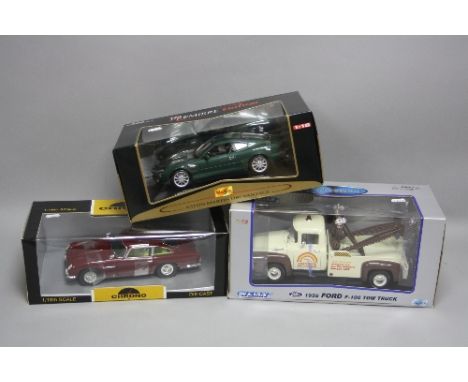 THREE BOXED MODERN DIECAST VEHICLES, Maisto Premiere Edition Aston Martin DB7 Vantage, Chrono Aston Martin DB5, No.H1002 and 