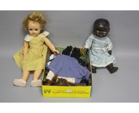 TWO 1950'S PLASTIC DOLLS, no markers marking, first one has painted eyes and features, with moulded hair, pierced ears with h