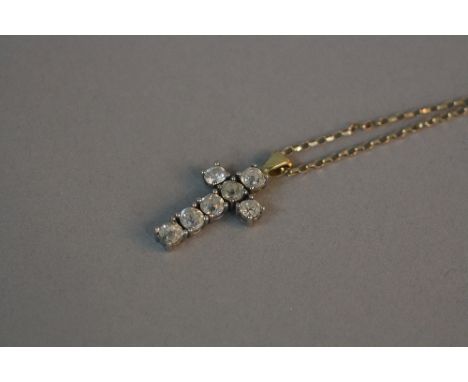 A MODERN DIAMOND SET CROSS, which has been set with earlier old cut diamonds, measuring approximately 26mm in length x 15mm i