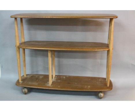 AN ERCOL BLONDE ELM SET OF THREE TIER DISPLAY SHELVES/BOOKCASE TROLLEY, approximate width 92cm x depth 32cm x height 72cm (s.