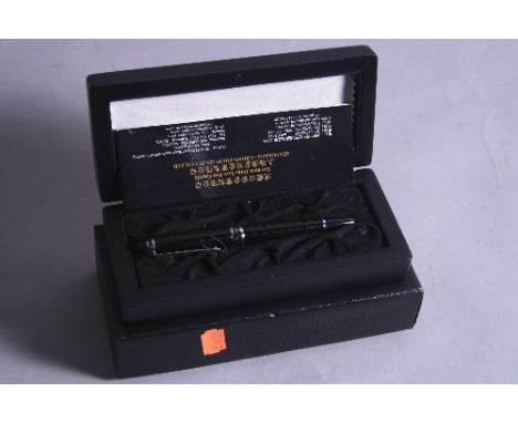 A DUKE ROLLERBALL PEN, in it's original presentation box, cloth, instructions and outer packaging, finished in black and chro