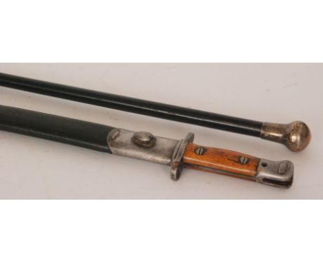 A silver topped ebonised walking stick together with a 1907 Wilkinson pattern bayonet and scabbard (2)