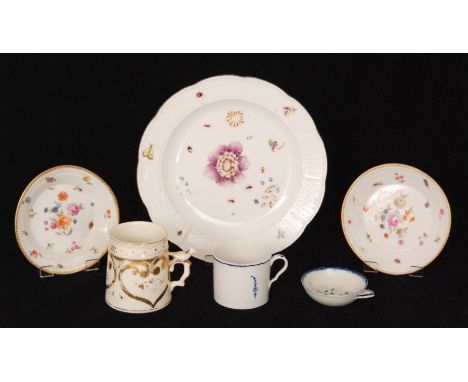 A late 18th to early 19th Century Meissen shallow plate decorated with hand painted flower heads and insects, the border edge