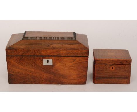 A 19th Century rosewood tea caddy of sarcophagus form with twin canisters, width 32cm (lacking mixing bowl), together with a 