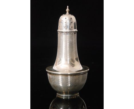 A hallmarked silver Art Deco sugar castor of stylised baluster form detailed with part engine turned decoration, height, 17cm