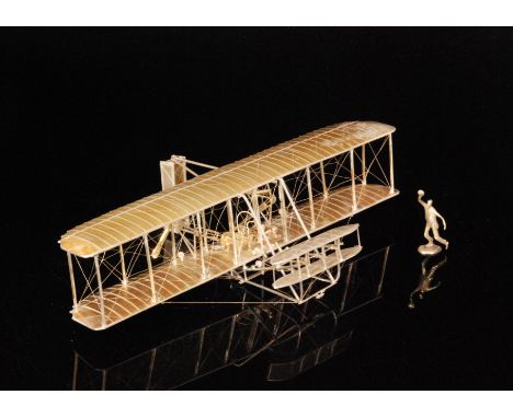 A 20th Century sterling silver scale model of the Wright brothers 'Flyer' limited edition No 595 by Paramount classics in a p