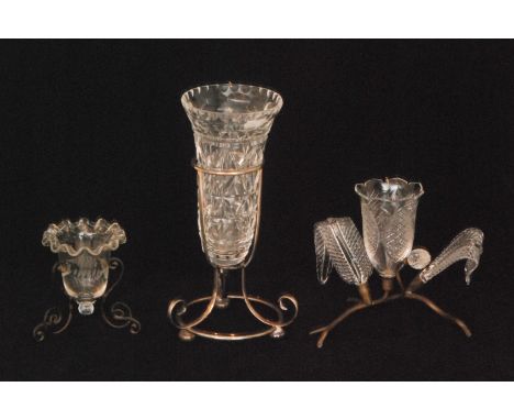 A late 19th Century Stourbridge four piece epergne with a bell shaped flower head flanked by two leaves with a bud to the fro