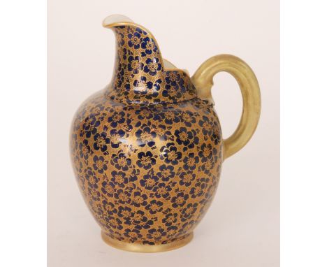 A Royal Worcester flatback jug, the body in royal blue with a gilt overlay pattern, green mark with date code for 1886, heigh