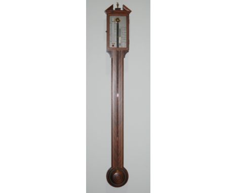 A George III style line inlaid mahogany stick barometer with silvered scale, height 94cm