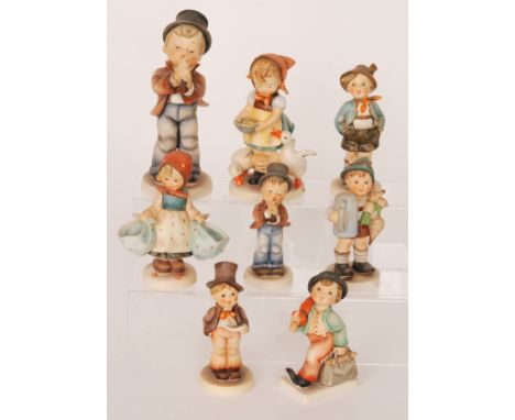 Eight assorted Goebel Hummel figurines comprising - Be Patient, Mother's Darling, For Father, Serenade, Merry Wanderer, Seren