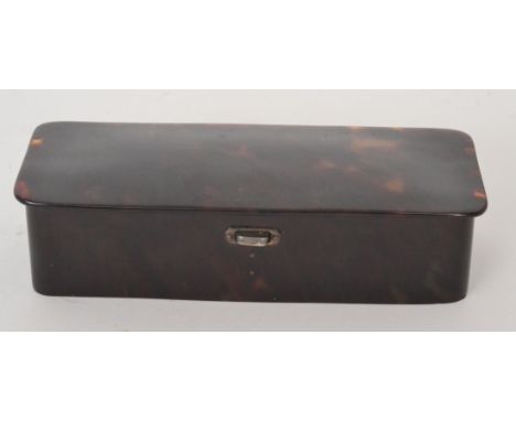 A late 19th Century tortoiseshell rectangular trinket box with rounded edge top and silver gilt hinges, width 17cm