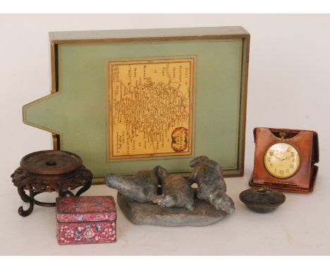A small patinated bronze bowl and cover, a Chinese cloisonne box and cover, a group of three soapstone carved seals on a rock