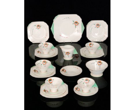 A 1930s Shelley Vogue shape part teaset comprising five teacups, six saucers, six side plates, milk jug, sugar bowl and a cak