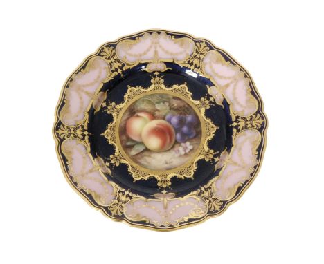 An early 20th Century Royal Worcester cabinet plate decorated by Richard Seabright, the central reserve with hand painted pea