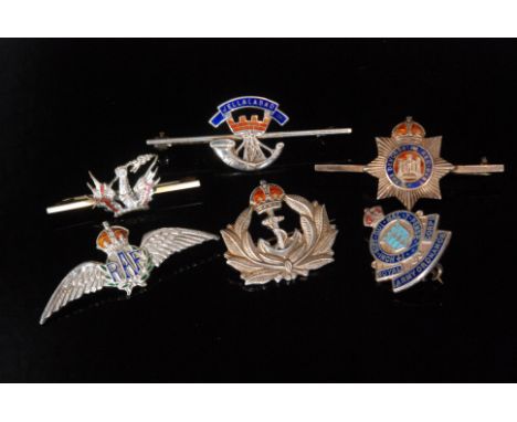 Six 20th Century silver and enamelled military sweetheart brooches, RAF, Devonshire, Army Ordnance, Jellalabad etc .(5). 